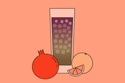 Illustration of the Cafe Ruby drink with a grapefruit and pomegranate next to the glass.